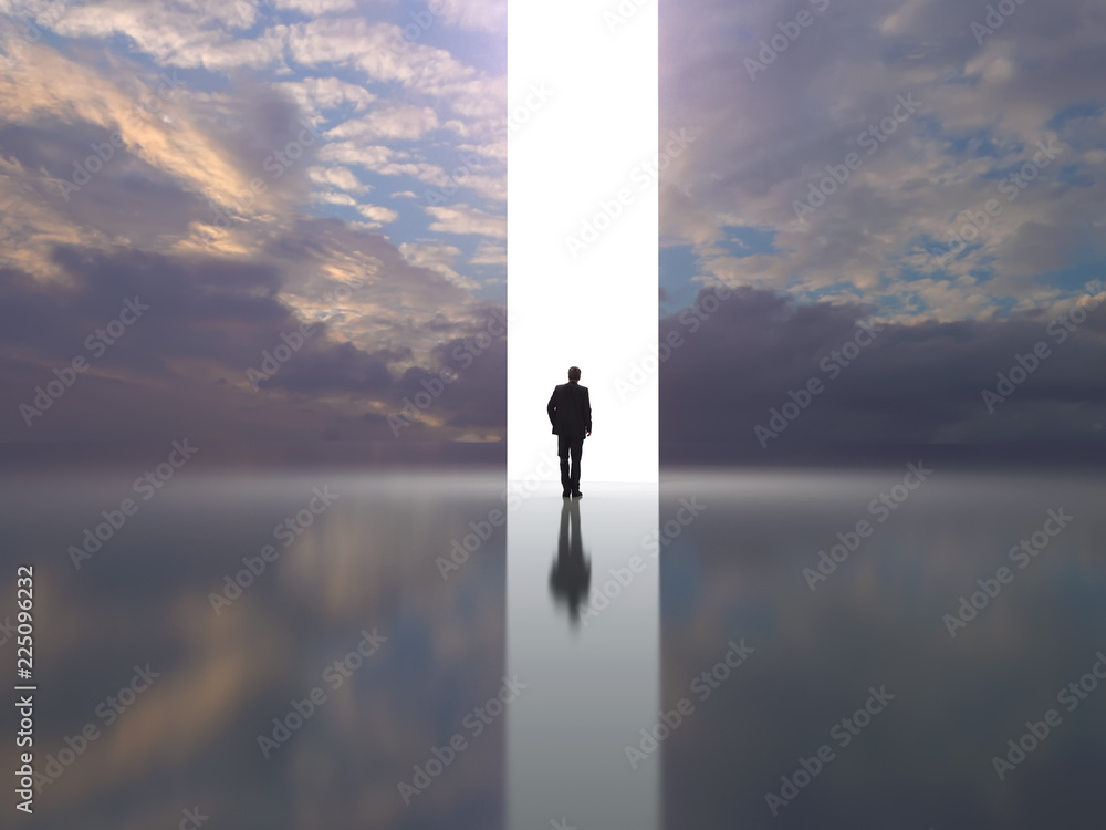 man stands near a light portal