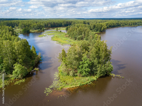 Aerial view of river Nemda with green riverside and islands. Summer 2018, Russia