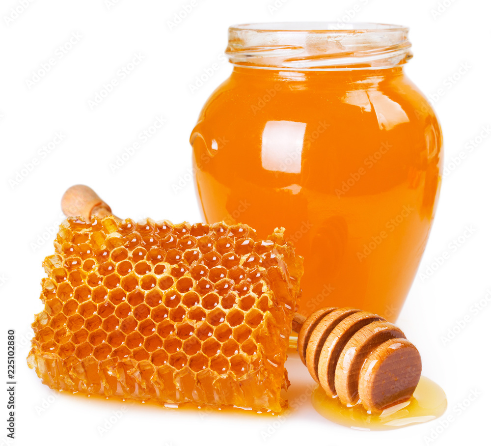 Honey with honeycomb on white background Honey with honeycomb on white background