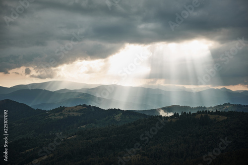 Stream of light. Panoramic view of stream of light captured over the dark mountains