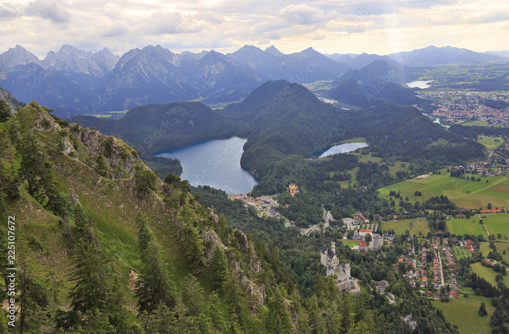 Aerial view of Neuschwanstein Castle, Alpsee Lake, Fussen and Bavarian Alps in Germany