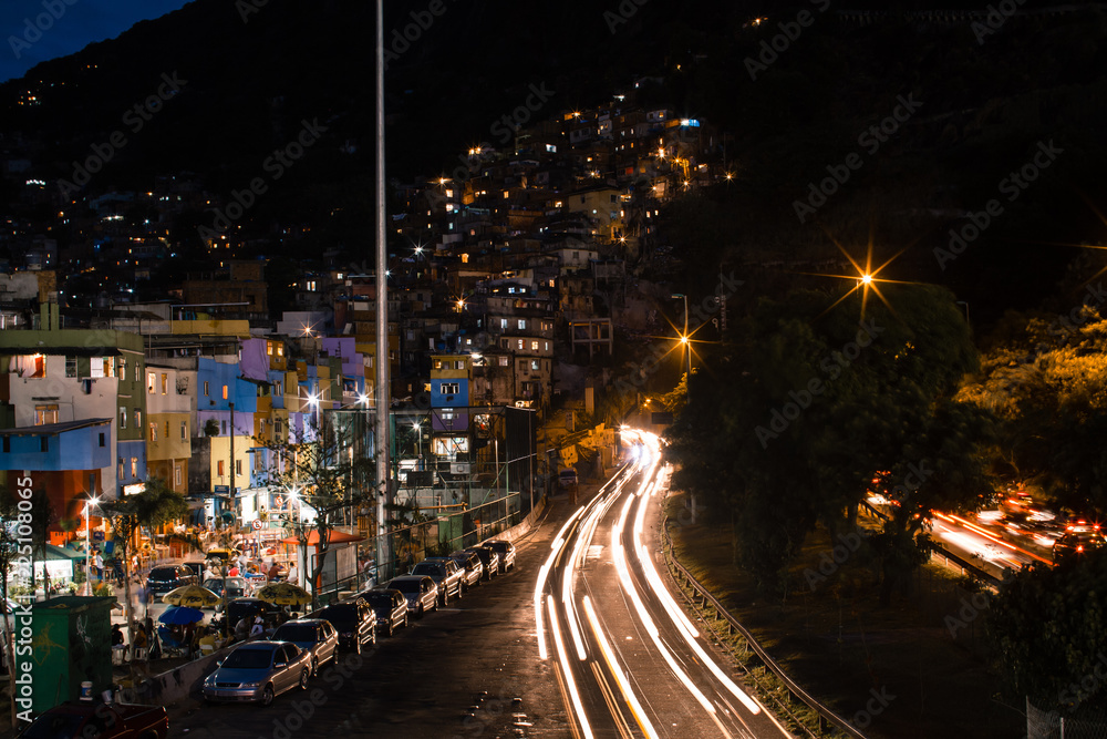 long exposure shot of the traffic through the tunnels below the Rocinha favela in Rio de Janeiro