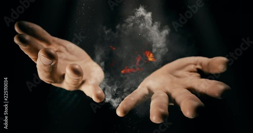 Modern magician conjuring smoke from his hands, Magic Trick Concept