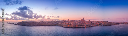 La Valletta sunrise with blue, orange, red, yellow sky in Malta