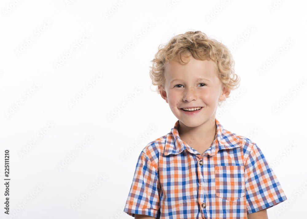 Happy, smiling, blonde, curly haired boy, isolated on white background Happy, smiling, blonde, curly haired boy, isolated on white background