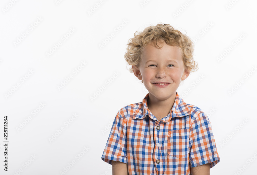 Giggling little boy in plaid shirt, isolated on white background Giggling little boy in plaid shirt, isolated on white background
