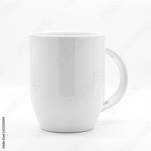 Blank coffee mug and spoon on modern white backdrops. Empty tea cup for your design.