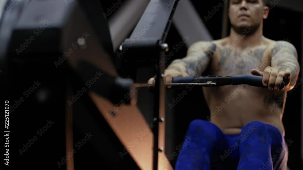 Men exercising and lifting weights bodybuilder champion athlete doing power clean in cross fit gym Men exercising and lifting weights bodybuilder champion athlete doing power clean in cross fit gym