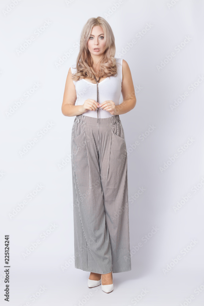 Full length portrait of cheerful blonde woman Full length portrait of cheerful blonde woman