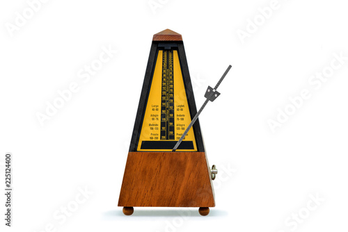 mechanical brown antique metronome on white