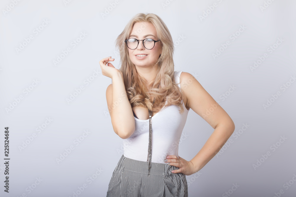 Portrait of smiling beautiful blonde woman looking camera Portrait of smiling beautiful blonde woman looking camera