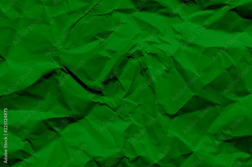 Fototapeta premium Green background and wallpaper by crumpled paper texture and free space.