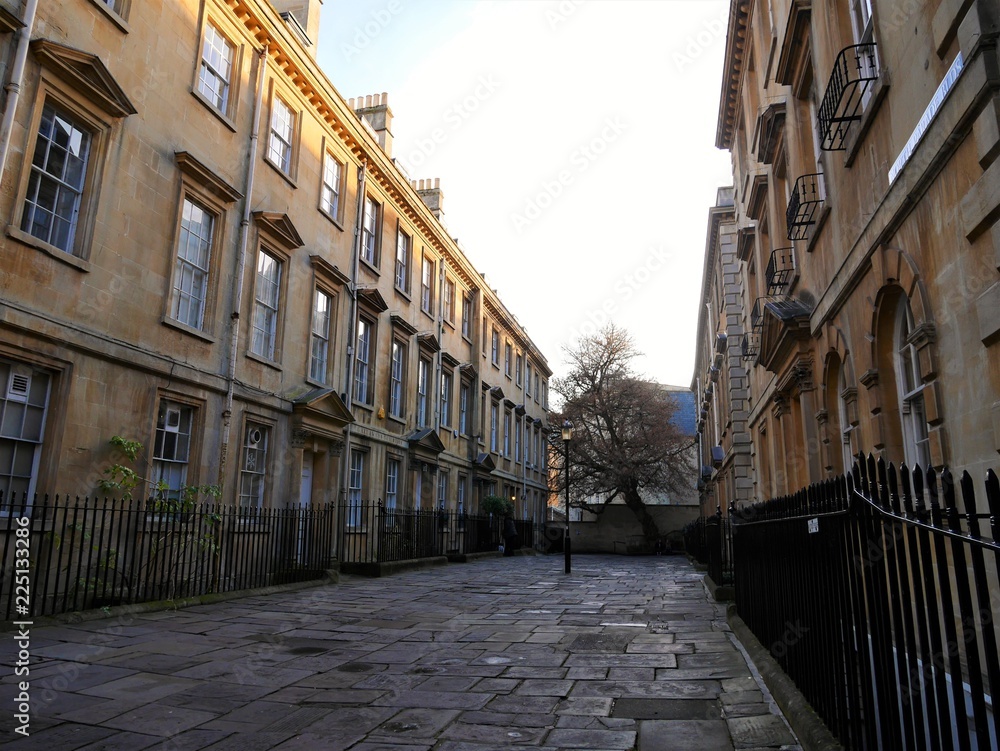 BATH, ENGLAND - DECEMBER 18, 2017: street view of Bath in the afternoon time. Bath is known for curative Roman-built baths that still exist there and a UNESCO world heritage site