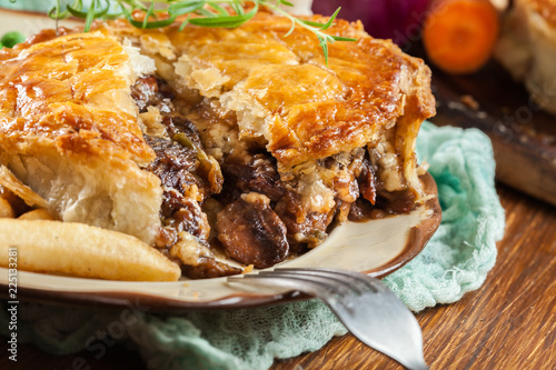 Homemade beef stew pie with french fries