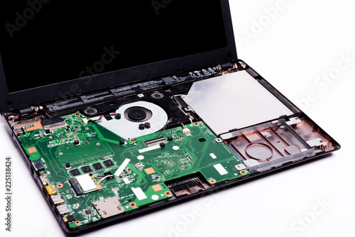 disassembled laptop on a white background, laptop repair, details of a laptop