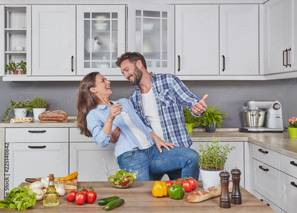 Couple dancing in the kitchen Couple dancing in the kitchen