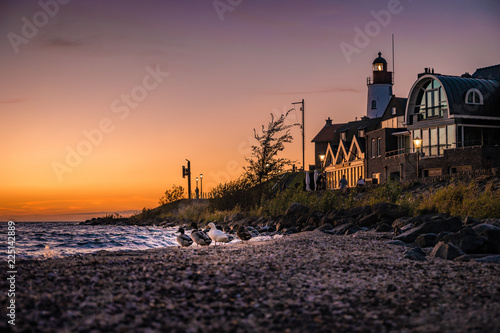 Urk ligthouse sunset lake ijsselmeer by Urk netherlands Flevolands former island of Urk photo