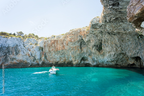 Apulia, Grotta Zinzulusa - A motorboat at the famous grotto of Zinzulusa