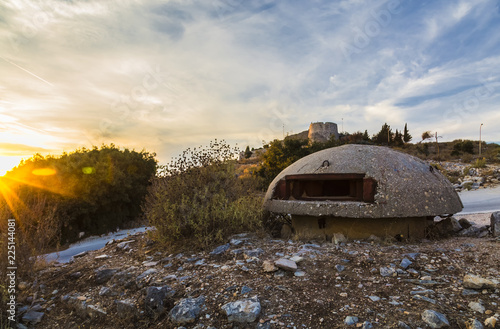 Close-up of one of the countless military concrete bunkers or dots in the southern Albania  built during the communist government of Enver Hoxha photo