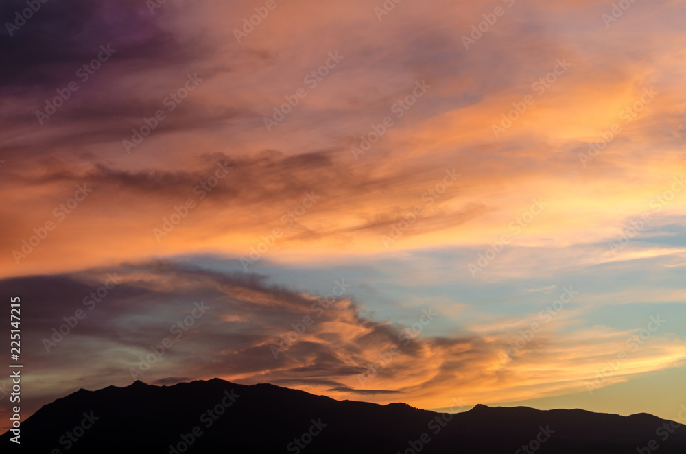 spectacular orange sunset with blue sky