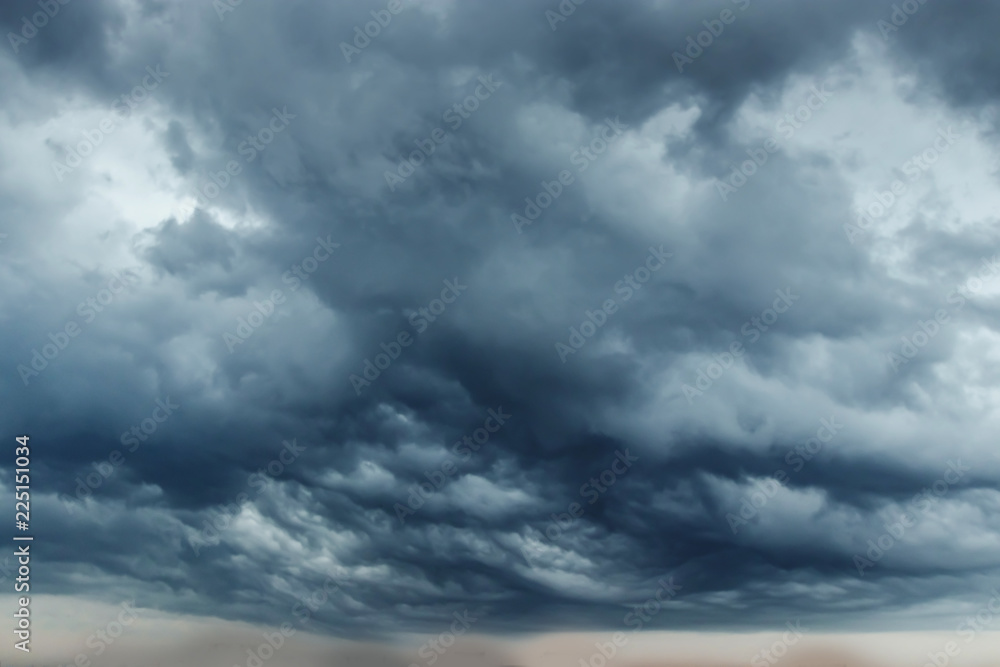 Storm clouds with contrast between dark gray and white that threaten a heavy rain. copy space