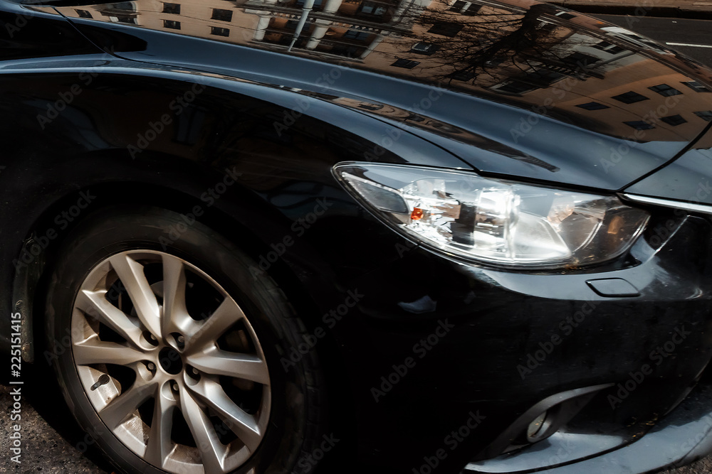 Creative background, High-beam headlight of the newest car. Copy space.