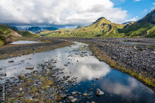 Glacial river in the dramatically beautiful and surreal landscapes of Thorsmork valley in the Highlands of Iceland at southern end of the famous Laugavegur hiking trail.