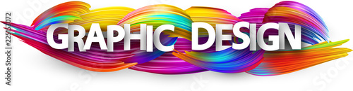 Graphic design paper banner with colorful brush strokes.