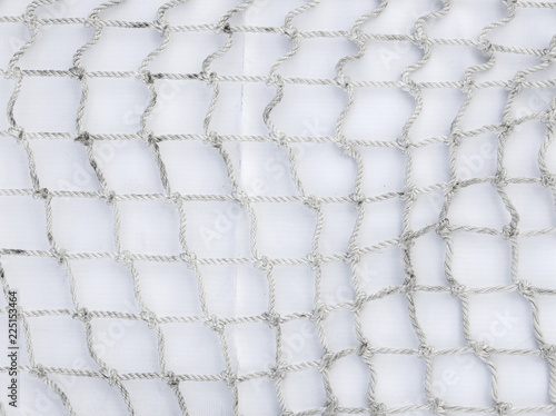 A rope mesh on a white substrate background template