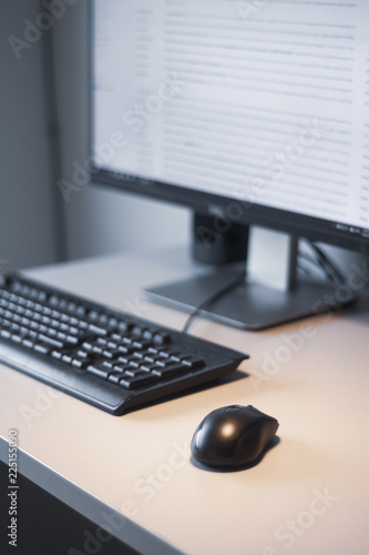 Working at home with personal computer and hands on the keyboard and mouse