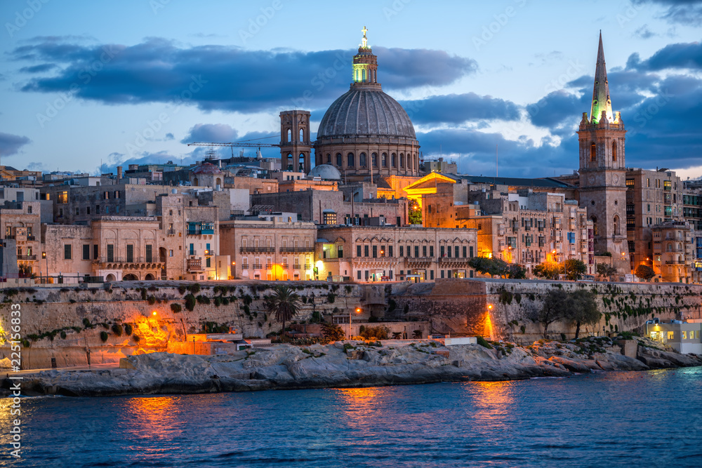 beautiful evening scene of Basilica Our Lady Mount Carmel in Valletta from Sliema, Malta, close up