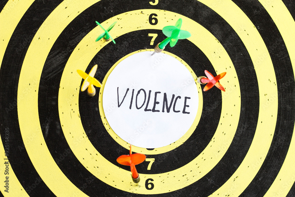 Target with darts in the center of which the inscription violence Target with darts in the center of which the inscription violence