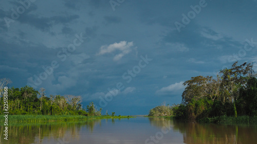 A storm is coming. View from a boat in the amazonas river in peru