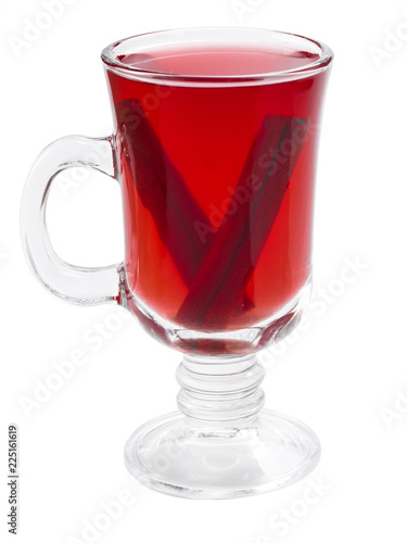 Mulled wine glass isolated on white. Hot red tea or other red drink in glass cup with cinnamon sticks. Isolated on white with clipping path.