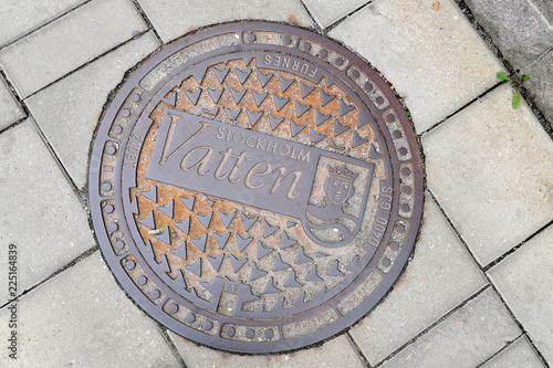 Canvas Print a manhole on the street of the old town in Stockholm