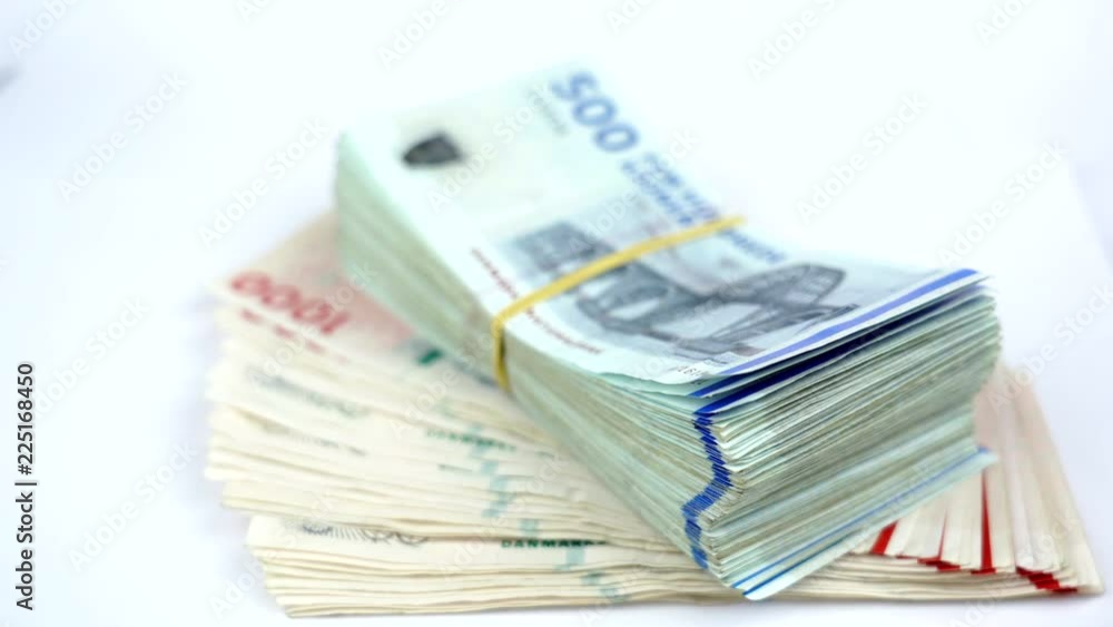 Danish krone. ( DKK ) 1000 and 500 Kroner banknotes. Danish krone. ( DKK ) 1000 and 500 Kroner banknotes.