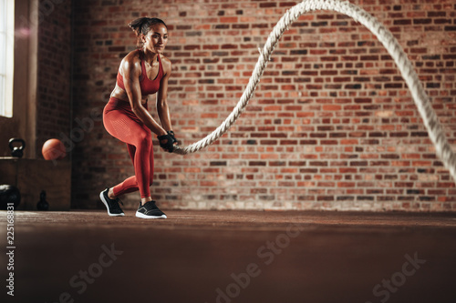 Woman doing cross training routine © Jacob Lund
