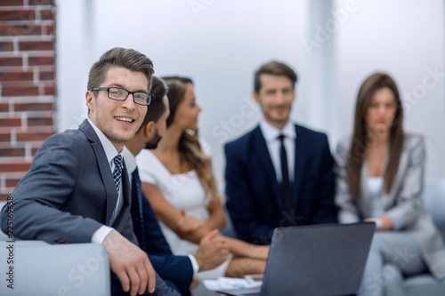 smiling businessman in the workplace