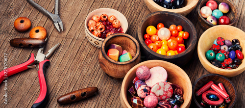 Fashion beads in wooden bowls