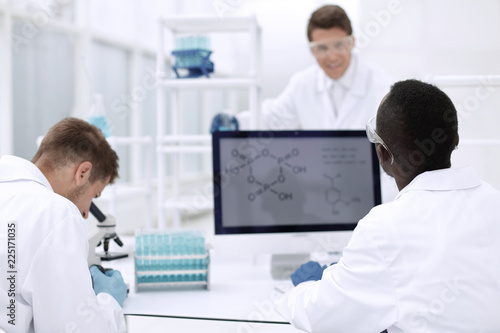group of scientists working in the laboratory
