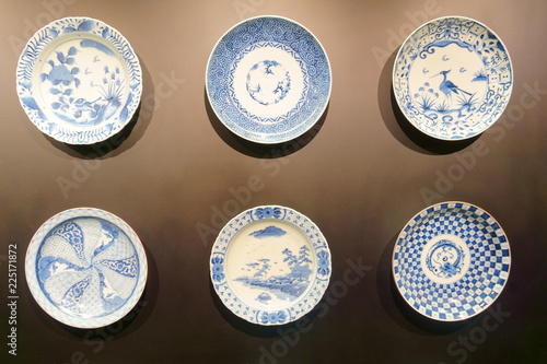 plates on the dark wall