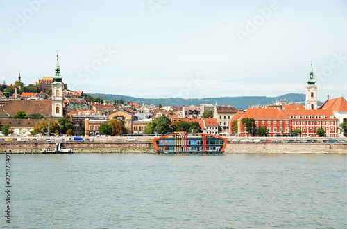 Danube embankment in Budapest with colorful historical buildings around, Hungary