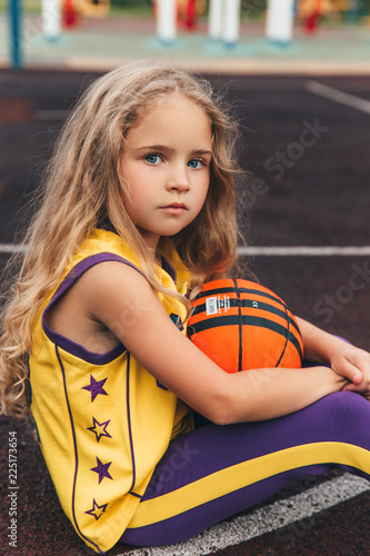 Streetstyle young model, fashion kid, girl in a sport style