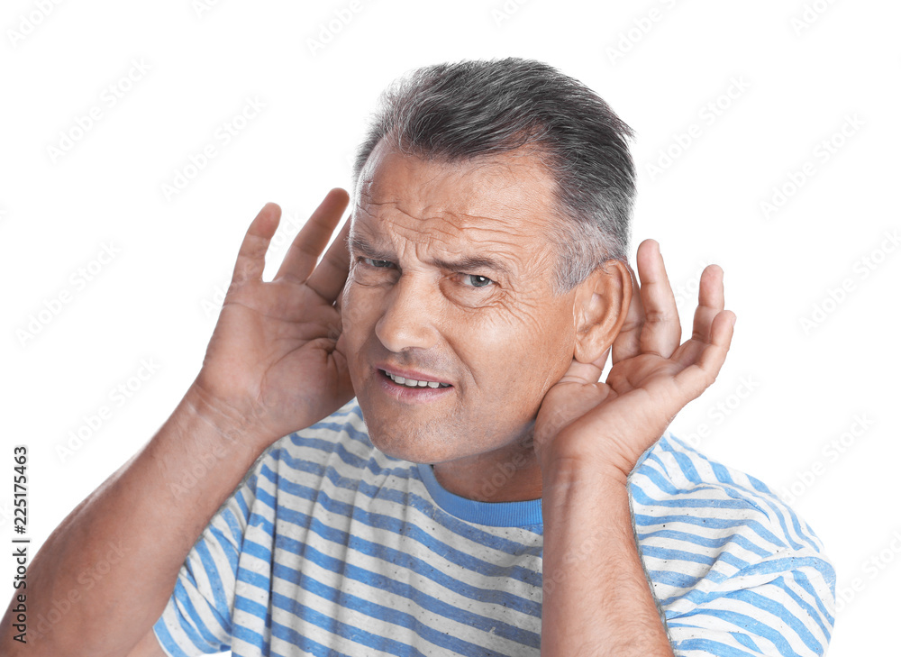 Mature man with hearing problem on white background Mature man with hearing problem on white background