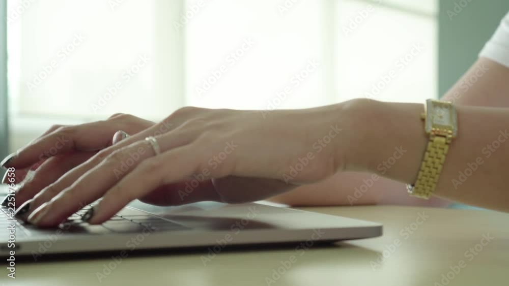 Young business woman typing on laptop keyboard. Young business woman typing on laptop keyboard.
