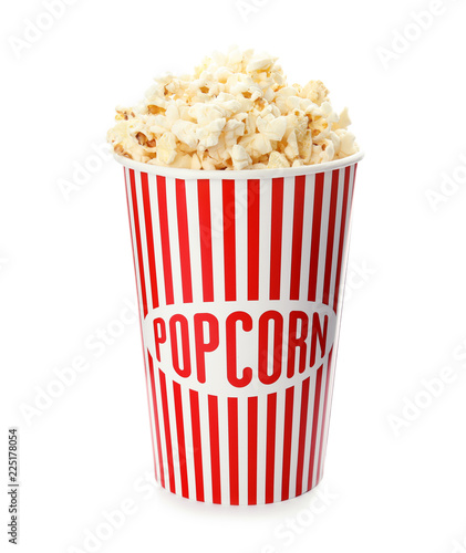 Carton cup with delicious fresh popcorn on white background