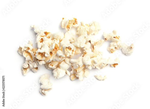 Pile of delicious fresh popcorn on white background, top view