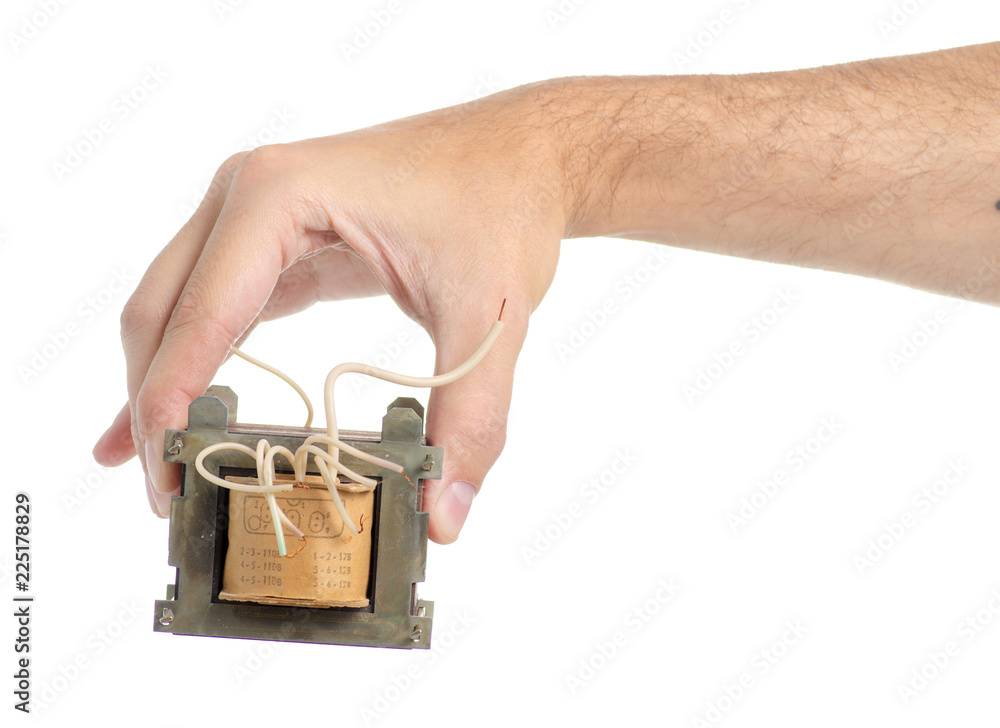 Obraz premium Electrical transformer power in hand on white background isolation