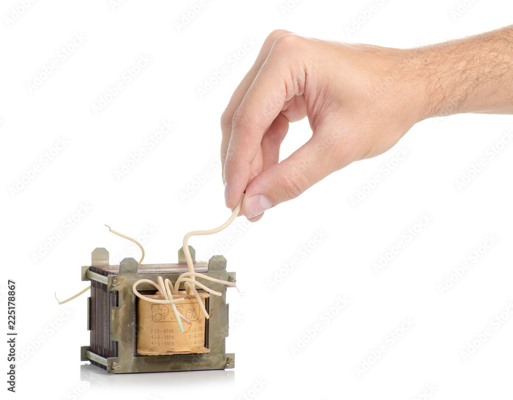 Obraz premium Electrical transformer power in hand on white background isolation