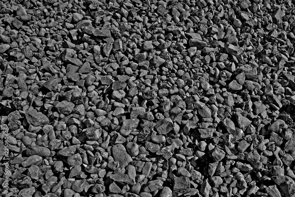 black background from gravel texture. Friable building material, consisting of pieces of rock of different sizes black background from gravel texture. Friable building material, consisting of pieces of rock of different sizes
